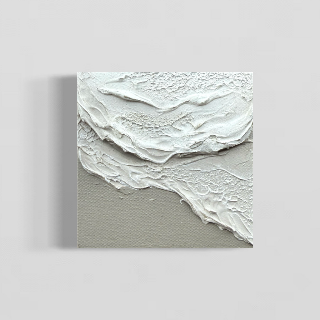 Abstract artwork with white, light grey and light cool brown wave textures on a miniature canvas