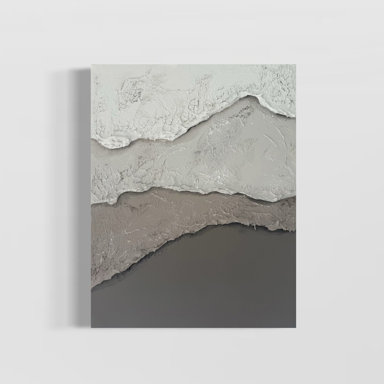 Abstract artwork with textured layers, transitioning from white, to light grey, to cool light brown to cool dark brown
