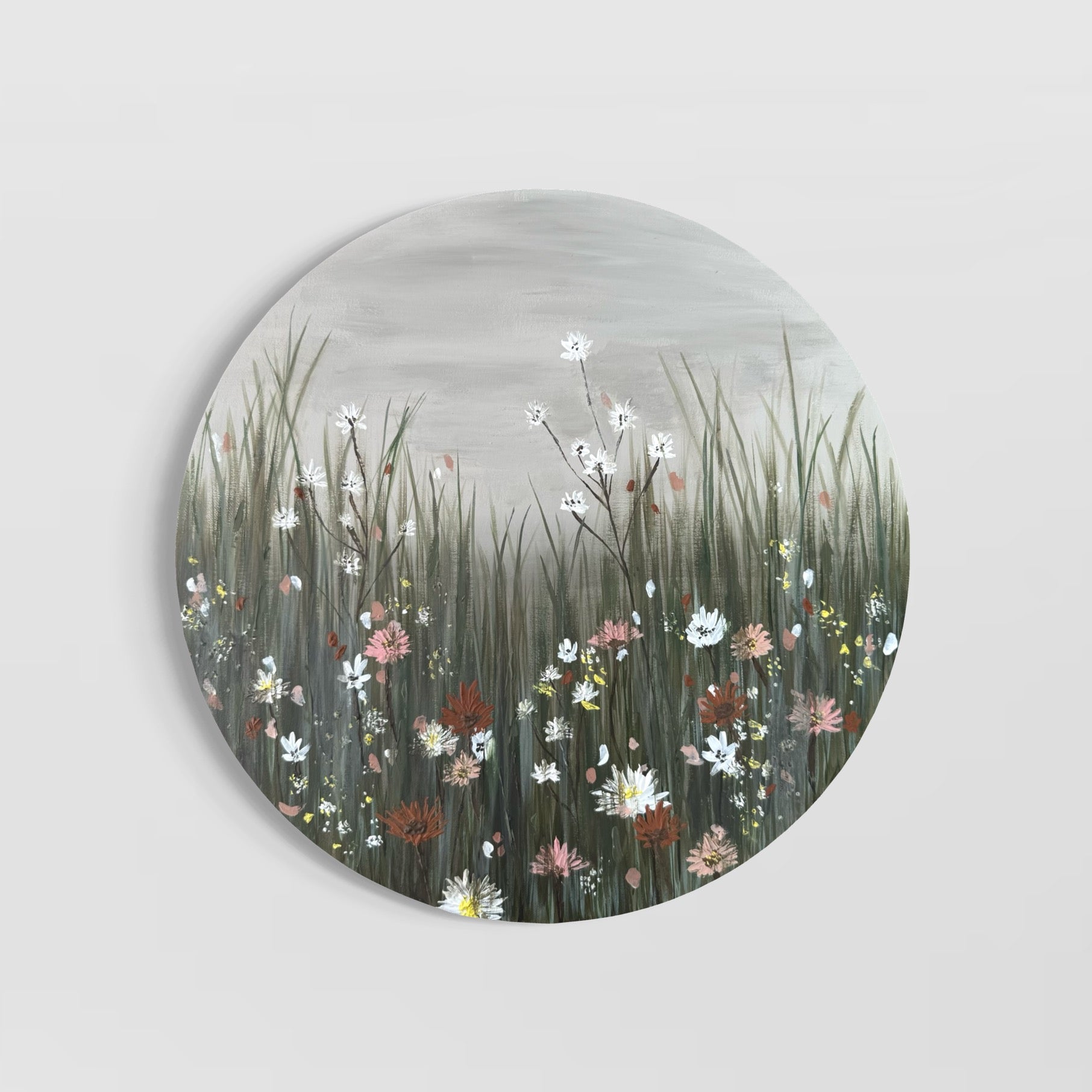 Circular artwork with field of textured flowers in the foreground and a soft grey moody sky